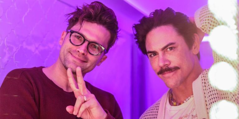 Vanderpump Rules stars Tom Sandoval and Tom Schwartz posing near makeup mirror