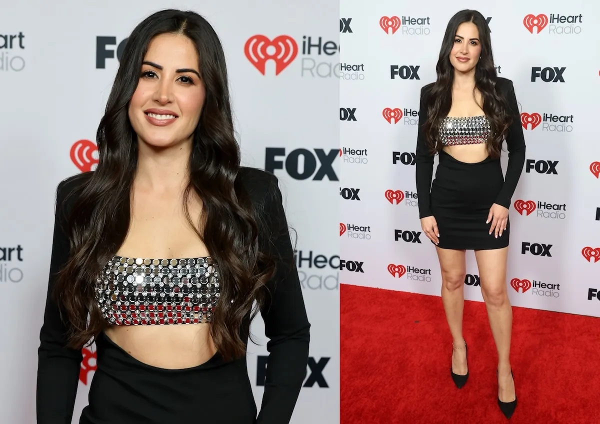 Vêtue d'une mini-robe noire, Michelle Lally sourit sur le tapis rouge aux Iheartradio Music Awards