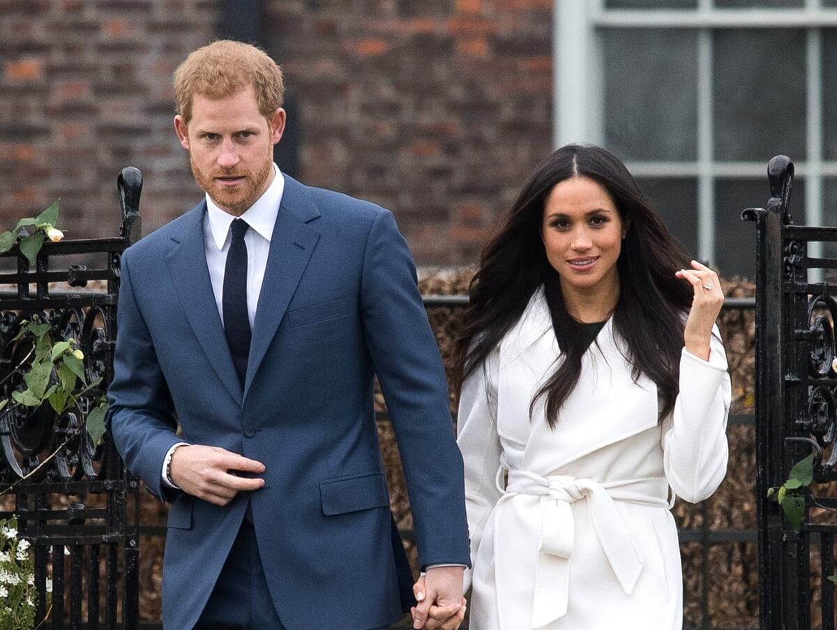 L'expression de Meghan Markle change lorsque le prince Harry dit qu'elle peut jouer en équipe avec le prince William et Kate